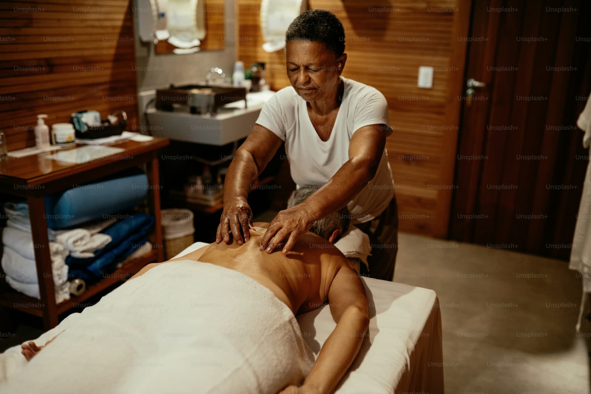 Therapist performing massage